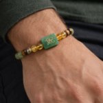 money magnet bracelet with zibu coin on men hand
