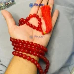 Red Onyx Japa Mala 108 Beads holding in hands