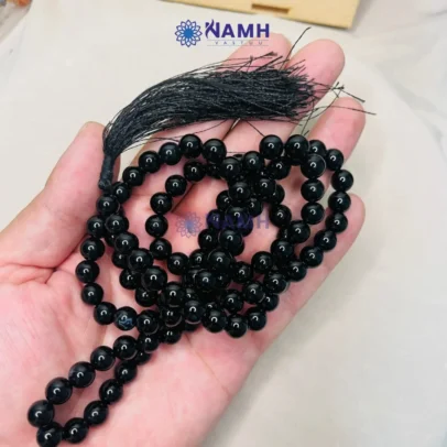 Black Hakik Japa Mala 108 Beads in hands