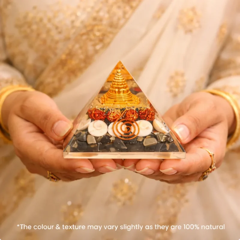 women holding money magnet pyrite pyramid