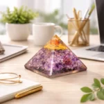 amethyst pyramid placed in a table