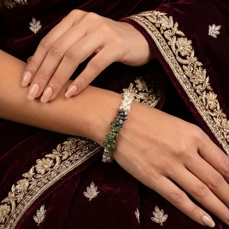 dhanyog chips bracelet in women hand
